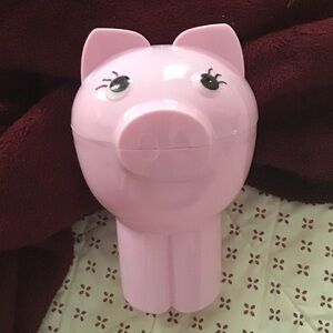 Pink Piggy vehicle snack container for kids or adults.  Fits in cup holder.